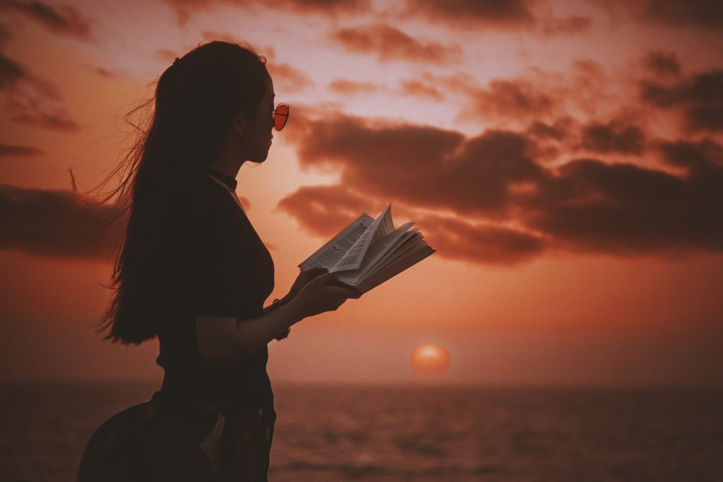 women reading Bible in tough times
