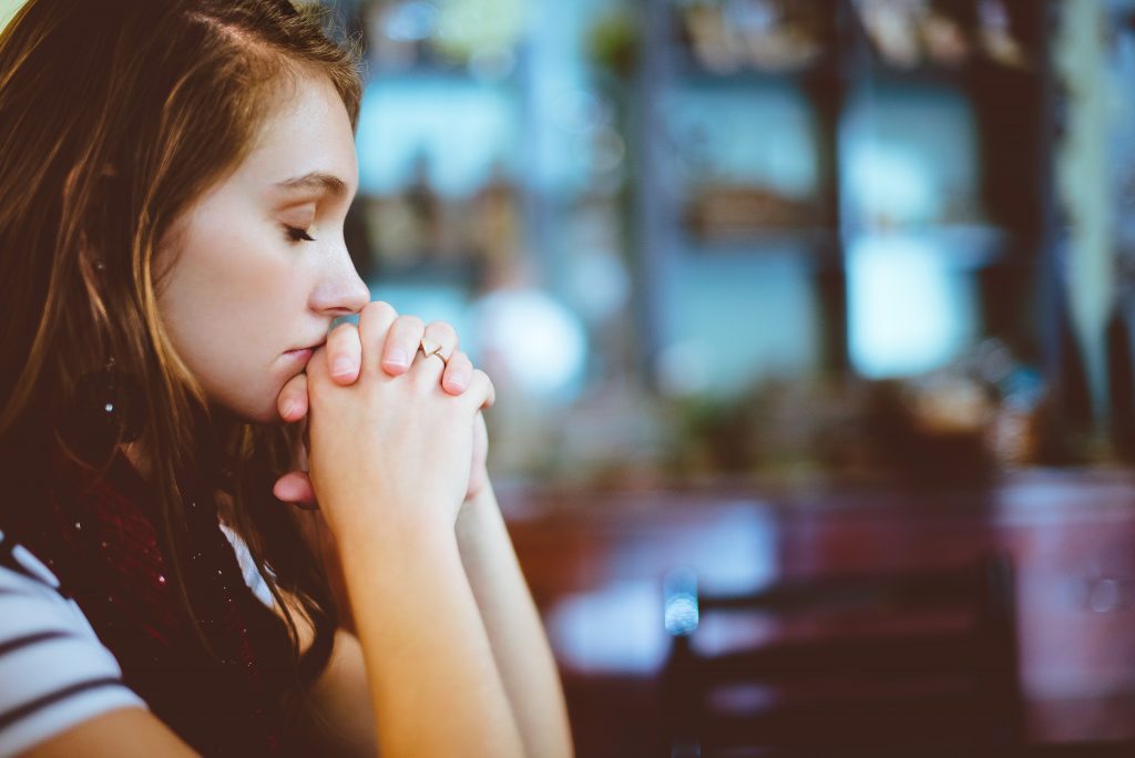 woman encouraging prayer