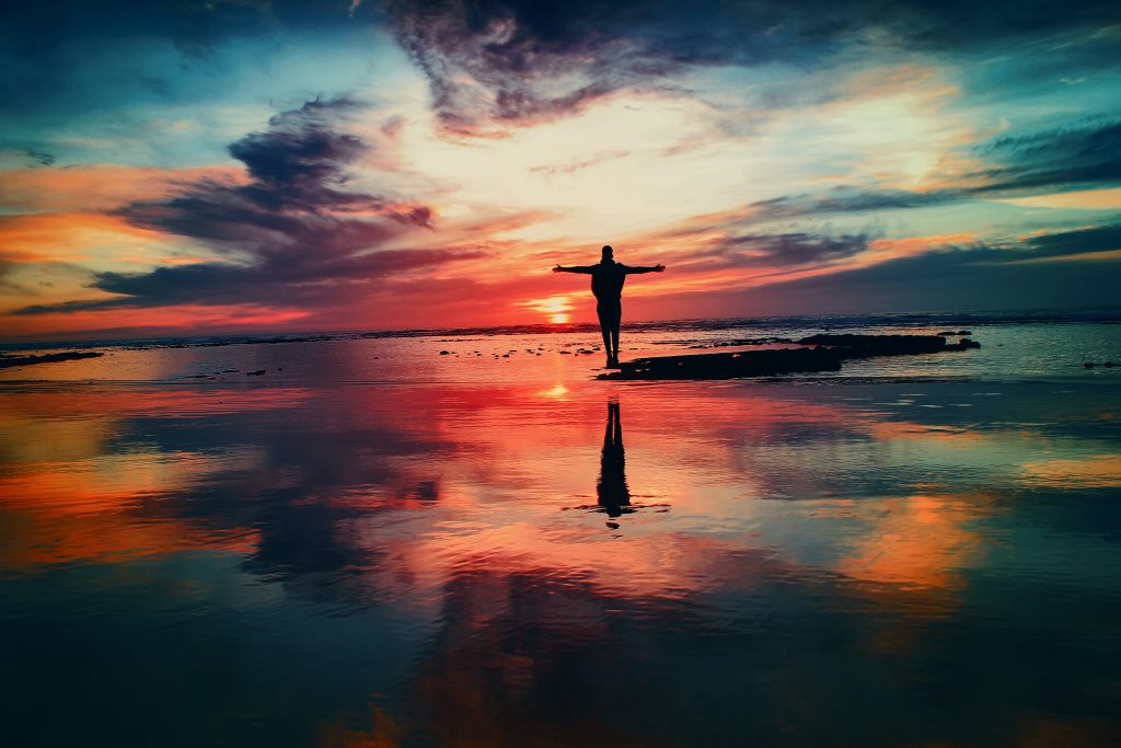 sunset with women from distress to joy in praising God
