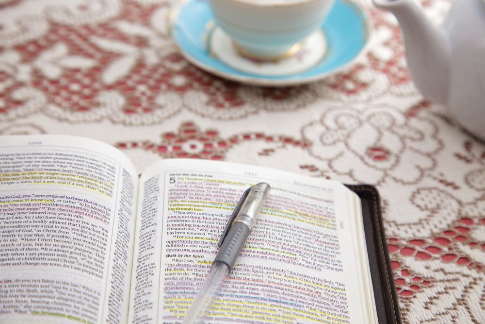 Bible pen and coffee cup. Fifth Step of Submitting to God: Applying God's Will