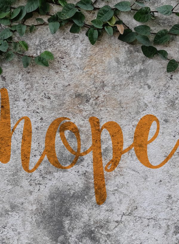Gray background with word Hope. God Gives us Hope as a Benefit of Faith