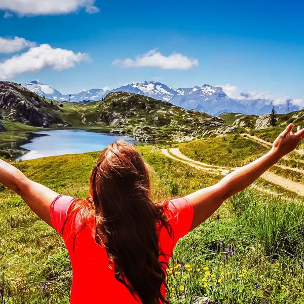 woman worshiping God in mountains Practical Steps to Embrace God's Sovereignty in Everyday Life