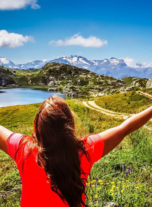 woman worshiping God in mountains Practical Steps to Embrace God's Sovereignty in Everyday Life