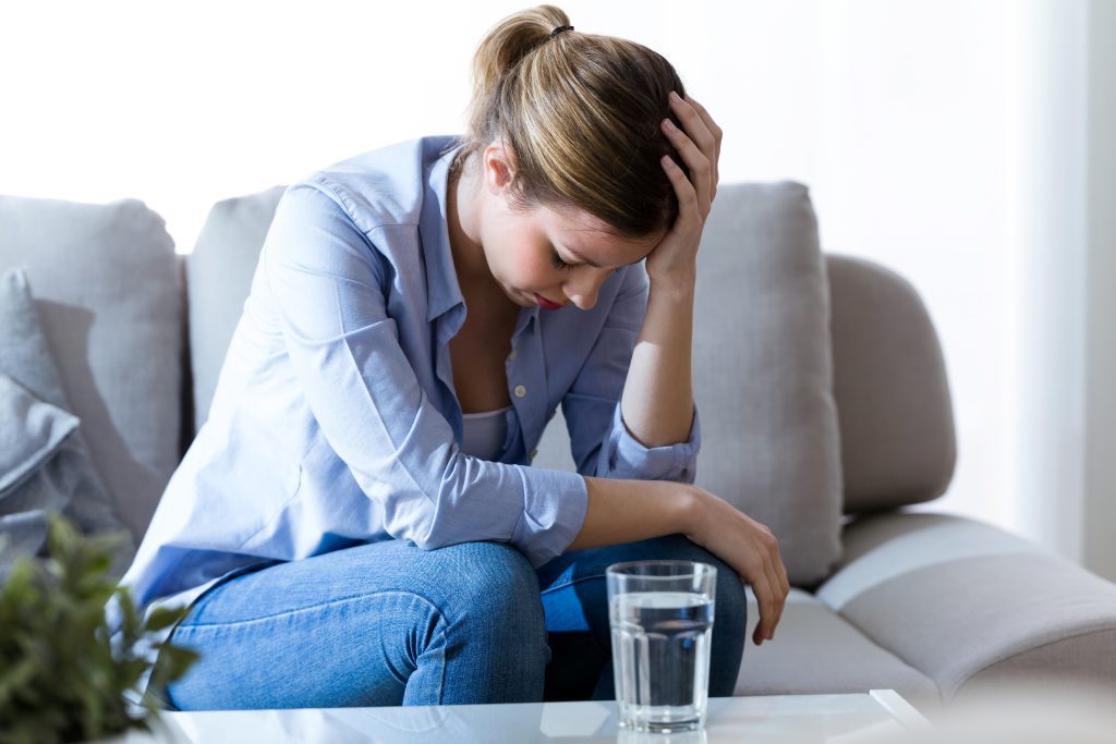 discourage woman sitting on sofa. What to Do When Prayer Feels Like It's Going Nowhere