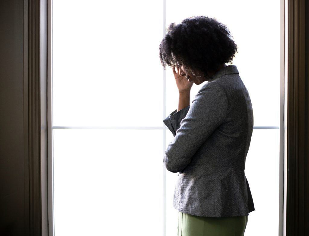 woman upset at window. When Trials Com: Scripture to Keep Your Heart Fixed on God