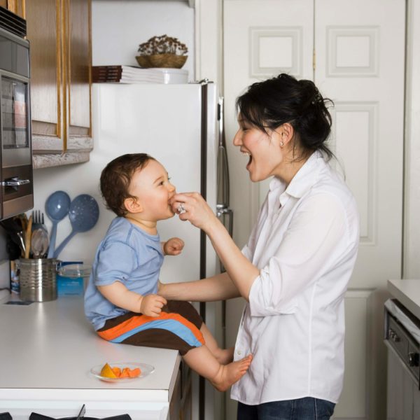 Mother with baby in kitchen. How to Wait on God Without Losing Heart.