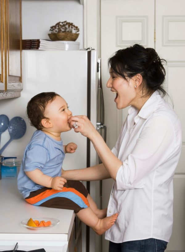 Mother with baby in kitchen. How to Wait on God Without Losing Heart.